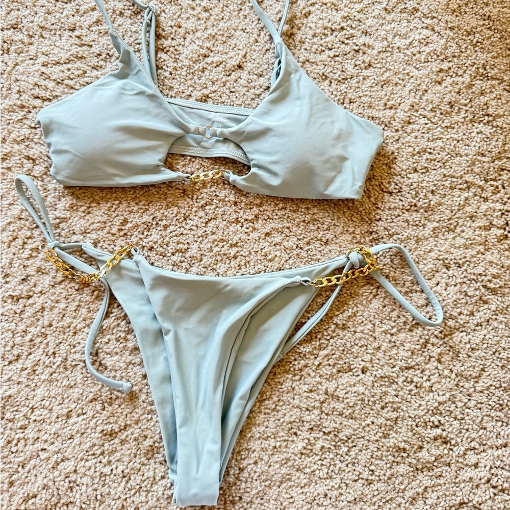 Stylish Women's Swimwear Set in Light Blue with Gold Accents